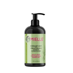 Mielle Rosemary Mint Strengthening Leave-In Conditioner bottle on a neutral background.