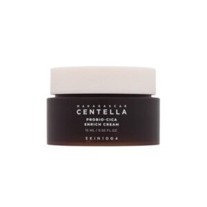 SKIN1004 Madagascar Centella Probio-Cica Enrich Cream in a jar with a green background.