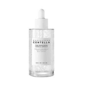 SKIN1004 Madagascar Centella Tone Brightening Capsule Ampoule in a product setting with capsules visible.